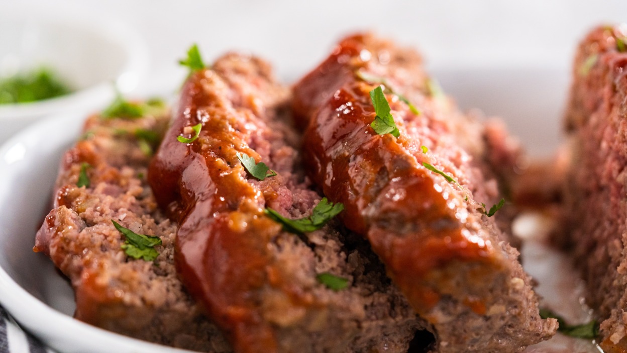 Up-close shot of sliced meatloaf.