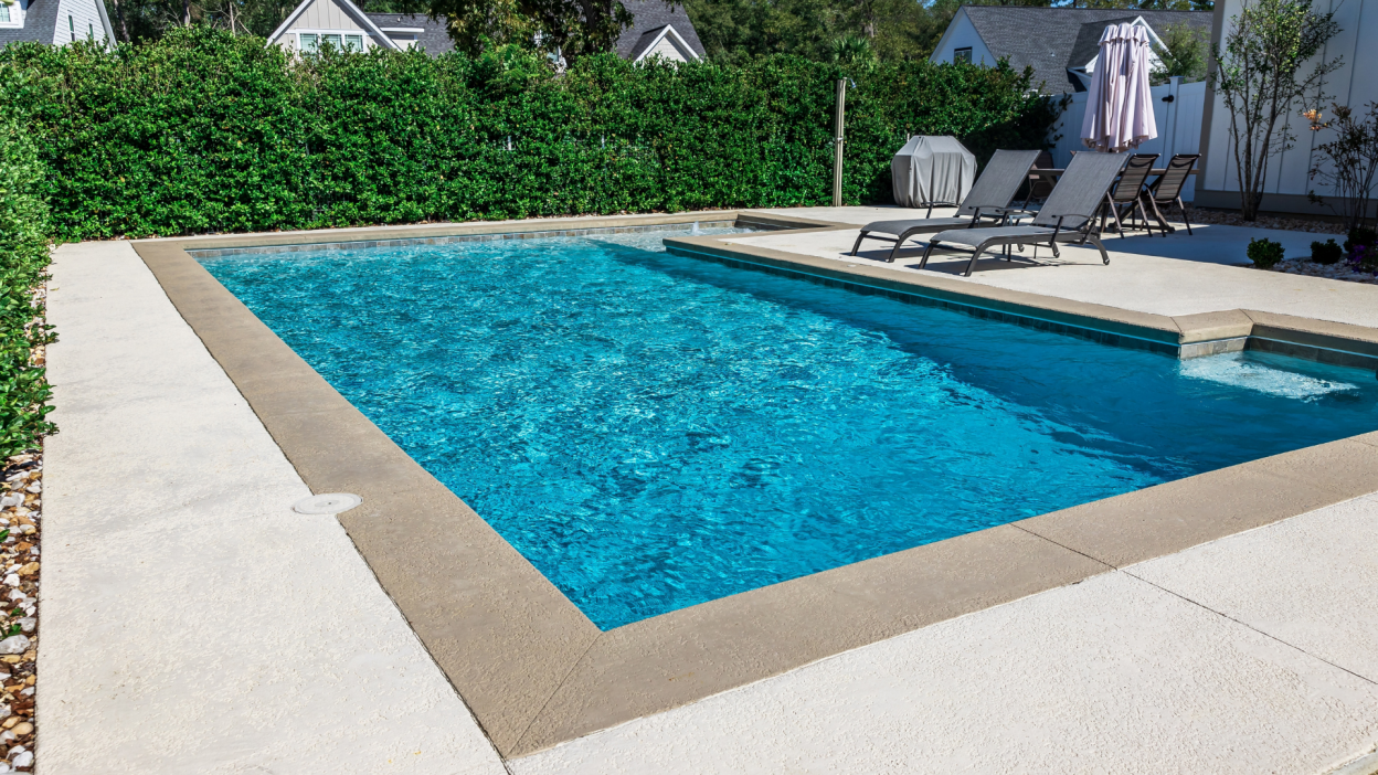 An in-ground backyard pool