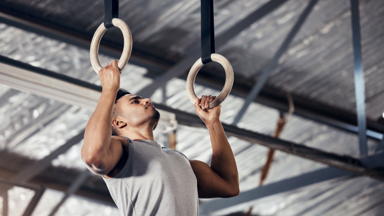 man on gymnastics rings