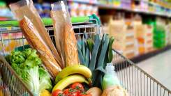 Shopping cart full of bread and produce