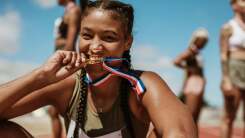 athlete with medal