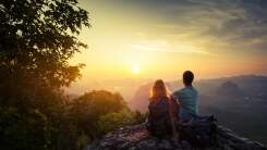 Couple watching the sunrise. 