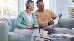 Older couple doing taxes.