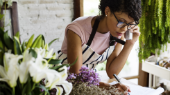 Self-employed florist taking a call