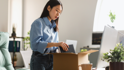 Woman leaving desk job