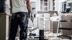 man doing renovation in kitchen