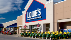 lawnmowers for sale parked in front of a Lowe's hardware store