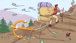 Person hiking up hill with money flying out of giant backpack; golden anchor dragging behind