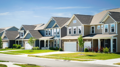 A photograph of a row of homes in a neat, planned community in the midwest.