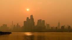 City skyline obscured by wildfire smoke