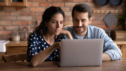 Couple shopping for insurance policies.