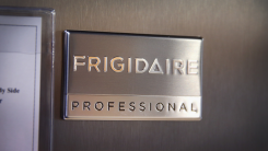 Zoomed-in image of the Frigidaire Professional logo on a stainless steel appliance