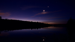 Celestial alignment of Venus, the moon and Jupiter at dawn