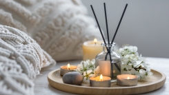 candles and diffuser in bedroom 