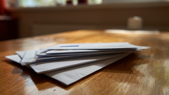 A pile of mail on a table