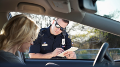 A police officer pulls a driver over