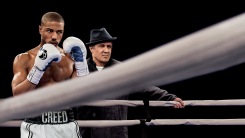 Adonis Creed and Rocky Balboa in the ring from 'Creed'