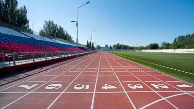 running track with bleachers for spectators