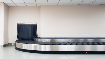 An empty baggage claim conveyor belt at the airport