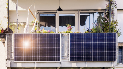 Solar panels installed over the railing of a balcony