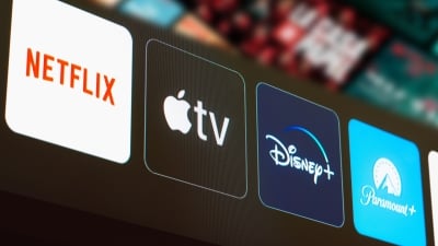 Netflix, Apple TV, Disney Plus and Paramount Plus logo is displayed on a TV screen.