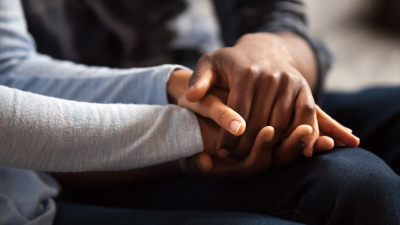 two people holding hands