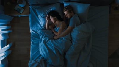 couple sleeping in bed