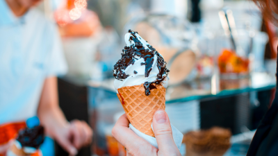 Hand holding ice cream cone