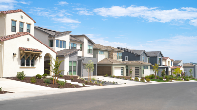 Row of houses in sunny neighborhood.