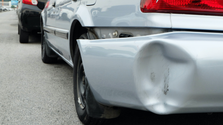 Damaged silver car 