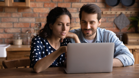 Couple shopping for insurance policies.