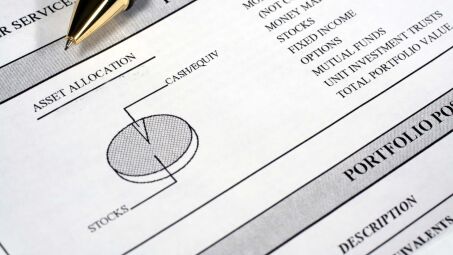 A photo of a printed out investment portfolio summary