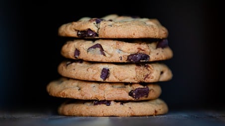 Close-up of a stack of chocolate chip cookies.