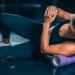 person using a purple foam roller