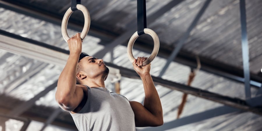 man on gymnastics rings